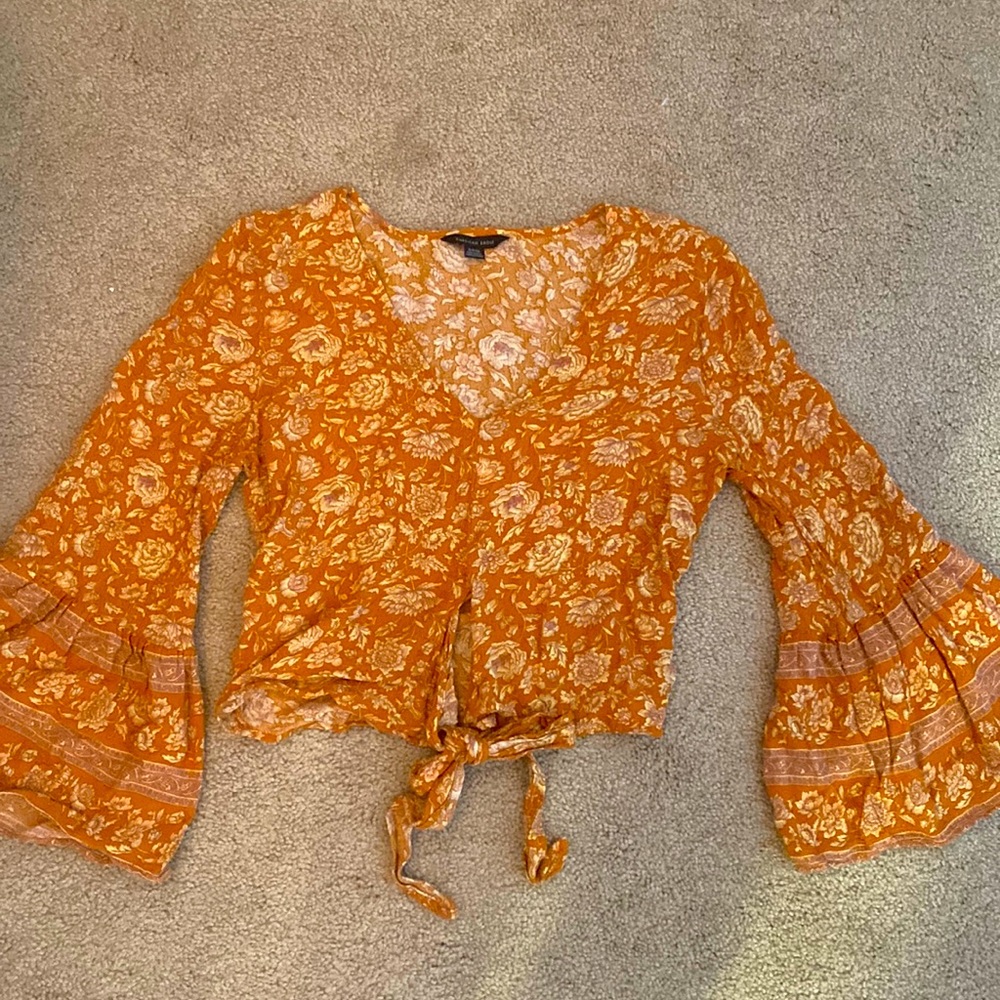 Orange, floral peasant top, tie front design with flare arms